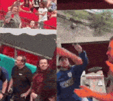 a group of people are standing in a stadium and a man is holding a sign in his hand .