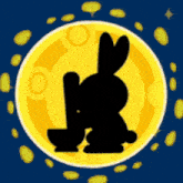 a silhouette of a rabbit sitting in front of a yellow moon