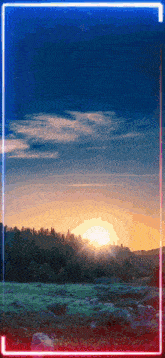 a picture of a sunset with a neon frame in the corner