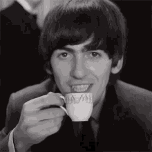 Sipping Tea George Harrison GIF - Sipping Tea George Harrison Any Road Song GIFs