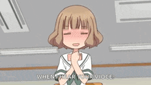 a girl in a school uniform is holding a card in her hands and saying `` when i hear your voice '' .