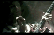 Brian May Playing Guitar GIF - Brian May Playing Guitar GIFs