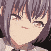 a close up of a girl 's face with a serious expression