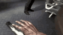 a person is playing a video game with their hands