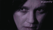 a close up of a woman 's face with the hashtag #crypttv visible