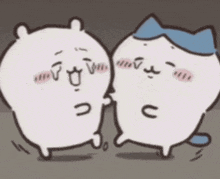 two cartoon cats are standing next to each other and talking to each other .