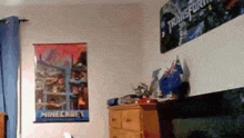 a bedroom with a minecraft poster and a transformers poster on the wall