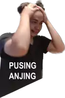 a man in a black shirt has his hands on his head and the words pusing anjing written on the bottom
