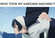 a man is kneeling down next to a girl in a sailor suit who took my karaoke machine ?