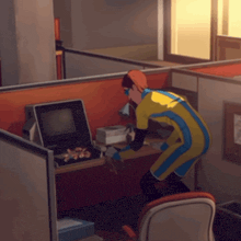 a person in a yellow and blue suit is standing in front of a computer