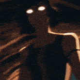 a blurry picture of a person holding something