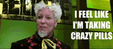 a woman with white hair and a beard is taking crazy pills