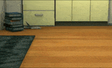 a stack of books sitting on a wooden floor