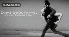 a black and white photo of a man and woman running on a beach with a quote that says come back to me