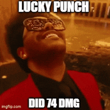 a man wearing sunglasses and a red jacket with the words lucky punch did 74 dmg on it
