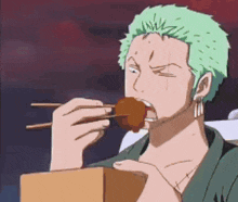 a cartoon character with green hair is eating a piece of food with chopsticks .