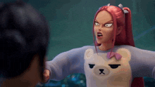 a girl with red hair is wearing a teddy bear sweater with a bow
