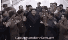 north korea kim un clapping