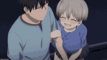 a man and a girl are standing next to each other and the girl is smiling and holding the man 's arm
