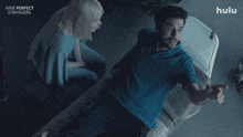 an advertisement for nine perfect strangers shows a man laying in a chair