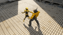 a yellow superhero is fighting another yellow superhero on a brick floor