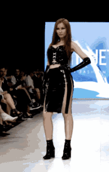 latex fashion show black latex latex skirt brunette long hair