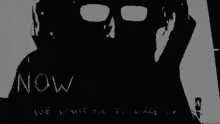 a black and white photo with the words wake up written on it .