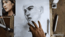 a drawing of a woman 's face is being made by animatica