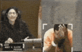 judge mindy s. glazer presiding over a case with a man covering his face