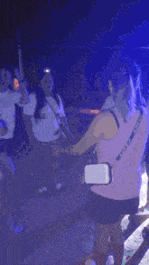 a blurry picture of a woman dancing with a number 1 on her belt
