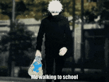 a man is walking to school holding a bag of trash .