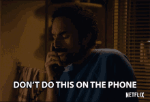 a man talking on a phone with the words " do n't do this on the phone "