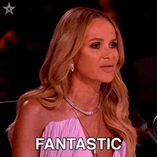 a woman in a pink dress says fantastic