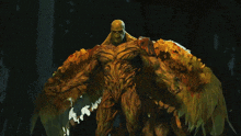 a statue of a man with wings is standing in a dark room