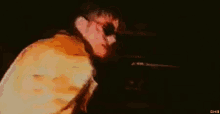 a blurry picture of a person with the letters dm3 in the corner