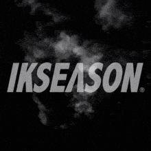 a black and white image of lightning and the word ikseason on it