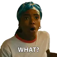 a woman with a surprised look on her face is wearing a white shirt that says what on it