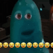 a close up of a cartoon character with smiley faces on it 's face