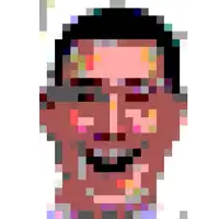 a pixel art of a man 's face with a smile