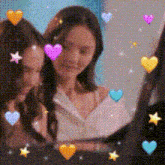 a woman is surrounded by hearts and stars in a pixelated image