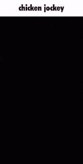 a man in a black shirt is walking in a dark room with the caption chicken jockey
