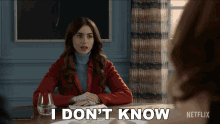 I Dont Know Emily Cooper GIF - I Dont Know Emily Cooper Lily Collins GIFs