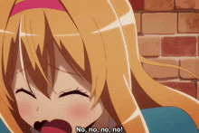 a girl with long blonde hair says no no no no in front of a brick wall