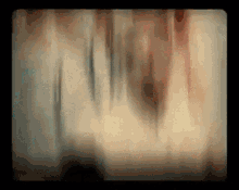 a blurred image of a wall with a black background