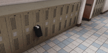a row of lockers in a hallway with a door that says bakery