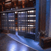 a room with a sliding glass door that says studio ga
