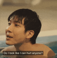 a man in a bathtub with the words " do i look like i can hurt anyone " below him