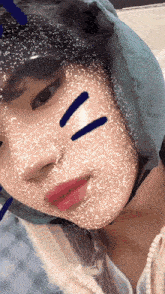 a close up of a person 's face with a mask on