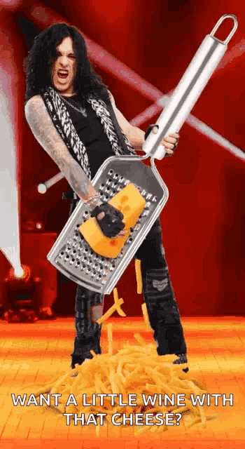 shredding cheese on guitar shaped cheese grater｜TikTok Search