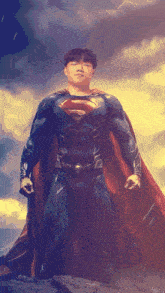 a man in a superman costume is standing in the rain